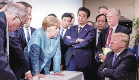 德国总理默克尔发布了G7峰会的照片，照片显示特朗普被“围攻”。<br>